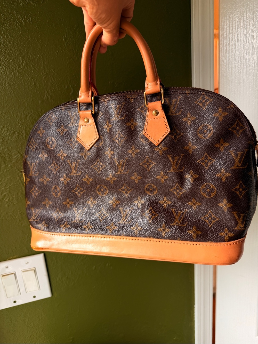 Louis Vuitton Brown Monogram Alma Handbag with Tan Trim